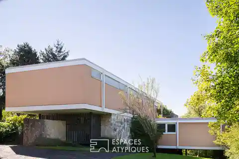 Architectural Masterpiece Surrounded by Wooded Grounds