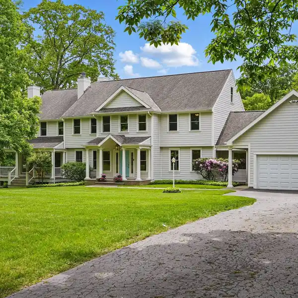 PRIVATE COLONIAL RETREAT ON OVER 5 ACRES