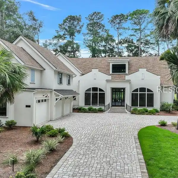PRESTIGIOUS GATED HOME WITH THREE-CAR GARAGE