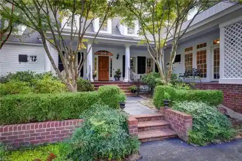 Storybook Cottage Elegance with Lush Garden Views