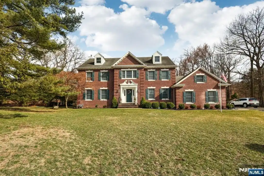 Custom Brick-front Center Hall Colonial