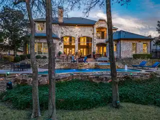 Custom Home by Award Winning Builder on 1/2 Acre Creek Lot in Gated Neighborhood
