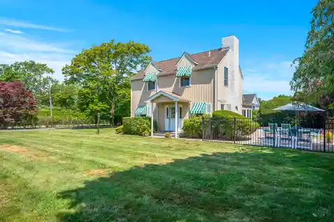 Serene Quogue Estate with Gated Entrance and Pool