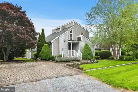 Turnkey Coastal Living Steps from Downtown