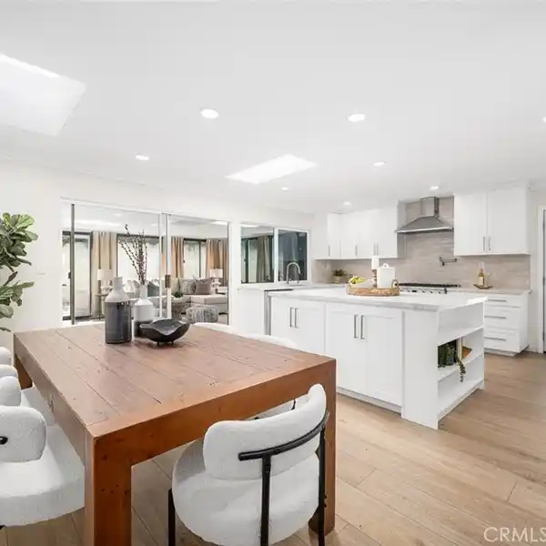 COMPLETELY REMODELED COASTAL SPANISH STYLE HOME