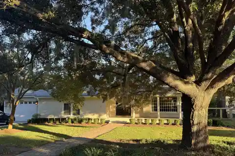 Sophisticated Lakefront Living with Sunlit Interiors & Scenic Views