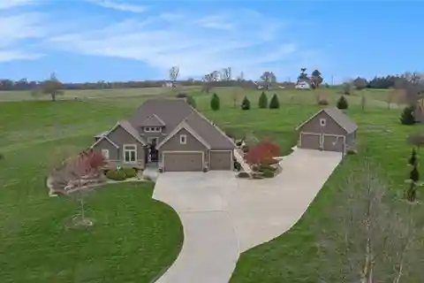 Custom Retreat in the Prestigious Bluffs at Whiskey Ridge