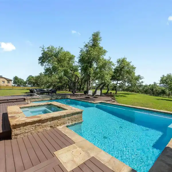 THE EPITOME OF HILL COUNTRY LIVING IN COVETED BELVEDERE