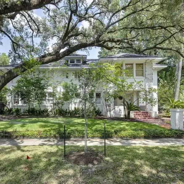 1930S DUPLEX WITH MODERN UPDATES AND POTENTIAL