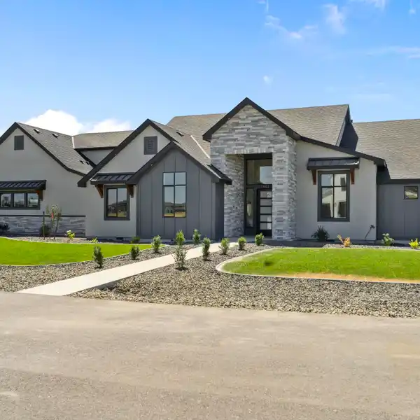 EXQUISITE NEW CUSTOM HOME WITH PANORAMIC VIEWS