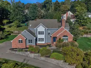 Turnkey Colonial in Sought-After Rolling Hill