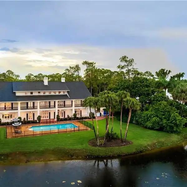 MASTERFULLY RENOVATED HOME INFUSED WITH MODERN ELEGANCE AND FLORIDA CHARM