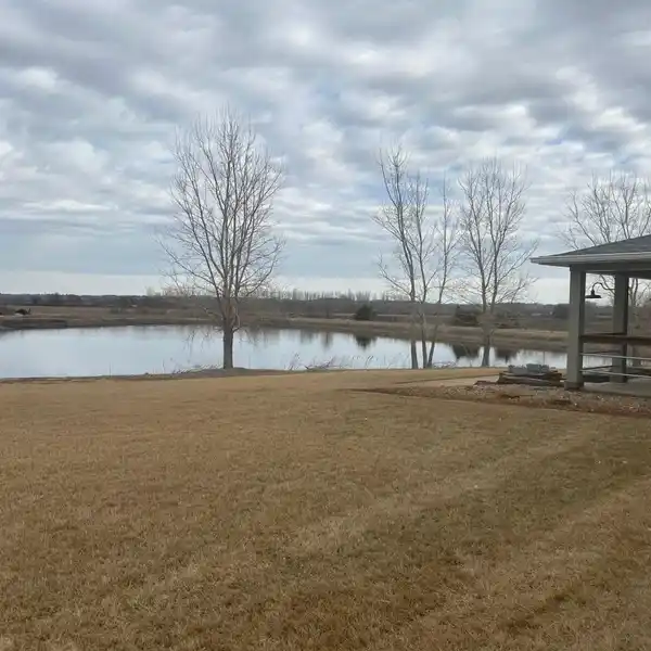 ACREAGE HOME WITH STUNNING LAKE VIEW