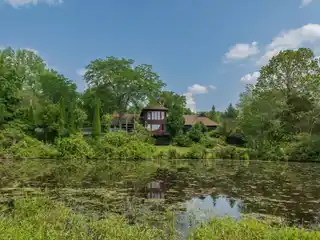 Architectural Innovation with Period Details on 82.5 Acres