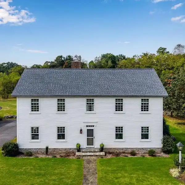 BEAUTIFULLY DESIGNED MODERN COLONIAL ON FIVE ACRES