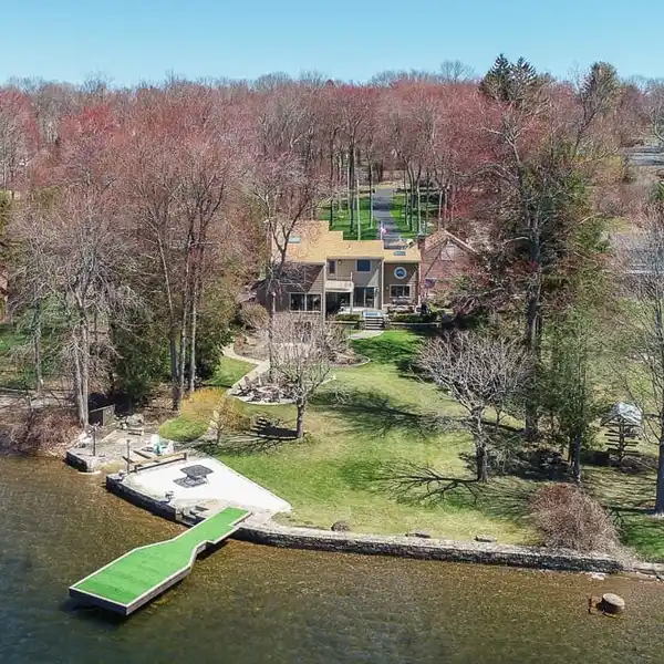 EXCEPTIONAL WATERFRONT LIVING ON PRIVATE CEDAR LAKE