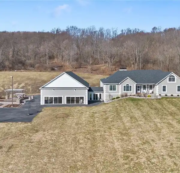 SPACIOUS FIVE BEDROOM RANCH ON OVER 40 ACRES