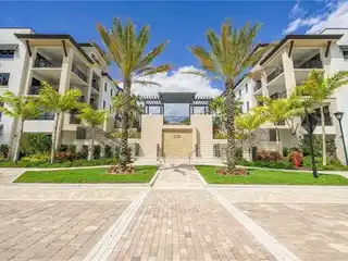 Elevated Living in Prestigious Naples Square