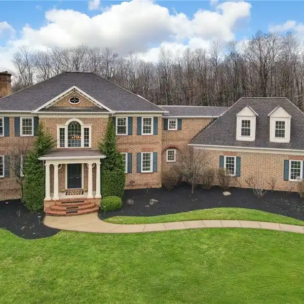 CUSTOM MASTERPIECE ON 4.8 ACRES