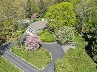 Hamptons-esque Cape Cod on Verdant Property