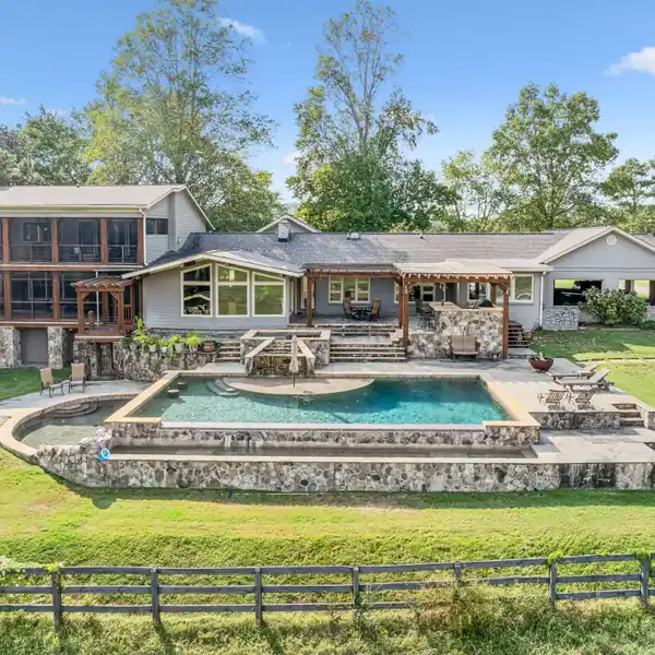 BREATHTAKING 16-PLUS-ACRE RIVERFRONT EQUESTRIAN ESTATE