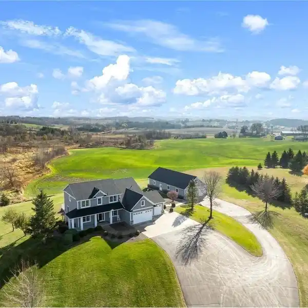 AMAZING HOME IN A DREAM ACREAGE SETTING