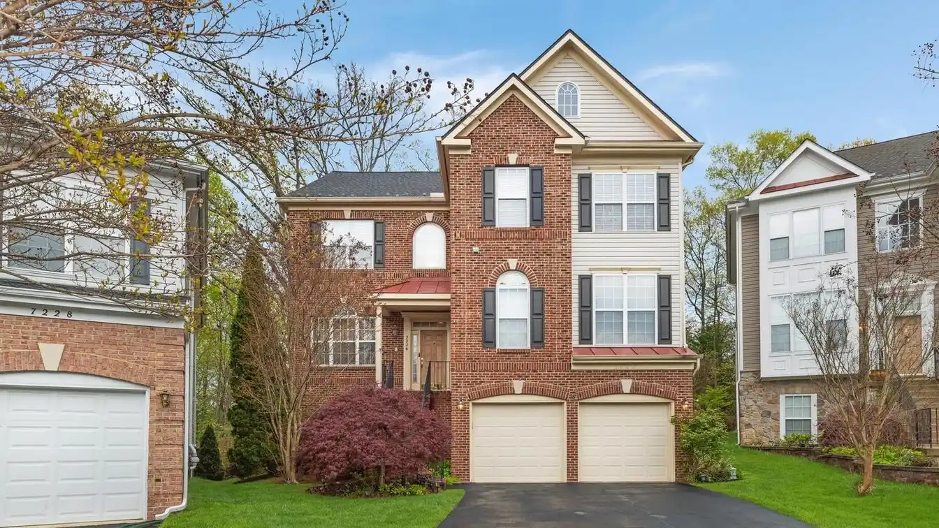 Elegant Brick-front Home with Scenic Backyard