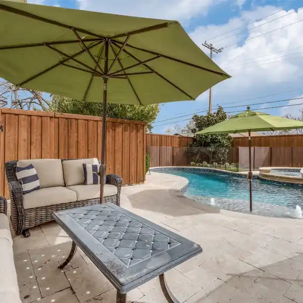 UPGRADED HOME WITH BACKYARD OASIS