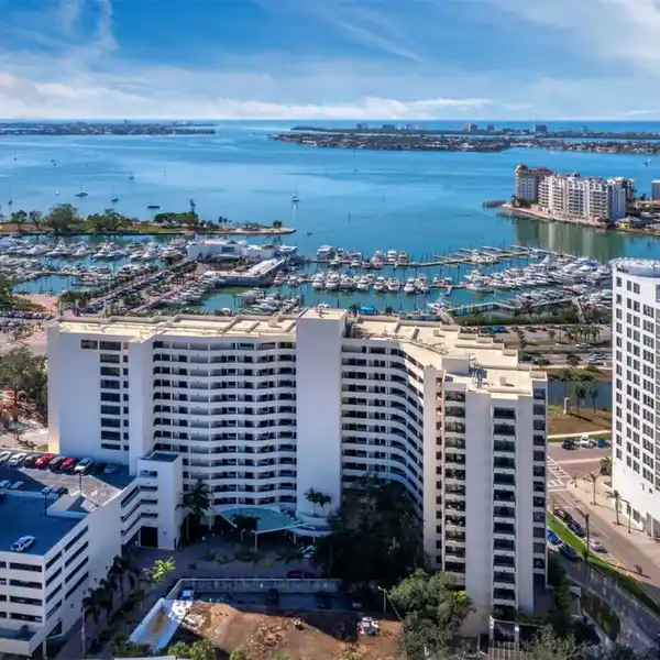 LUXURY LIVING IN THE COVETED BAY PLAZA CONDOMINIUM
