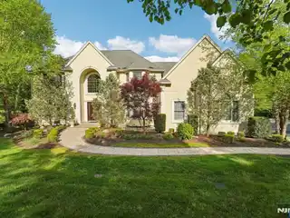 Elegant Colonial on Two Lush Acres