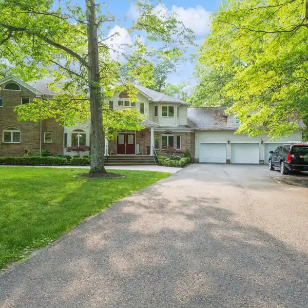 IMMACULATE EAST FACING CENTER HALL COLONIAL