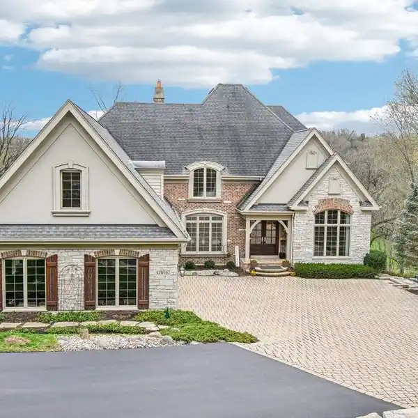 EXQUISITE BRICK AND STONE CUSTOM HOME