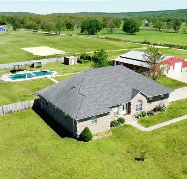 BEAUTIFUL BRICK HOME ON 5.7 ACRES
