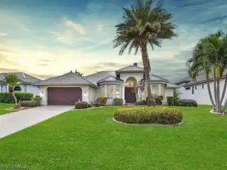 Meticulously Maintained Canal-front Home