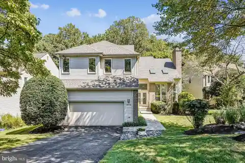 Contemporary Elegance Amid Serene Creekside Views