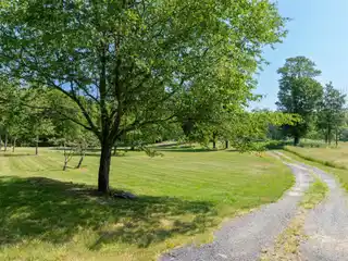 Cedar-Sided Traditional Home on 23 Acres