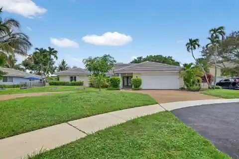 Boca Raton Gated Pool Home with Canal Views