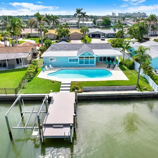 PINNACLE OF WATERFRONT LIVING FROM THIS BEAUTIFULLY REMODELED HOME