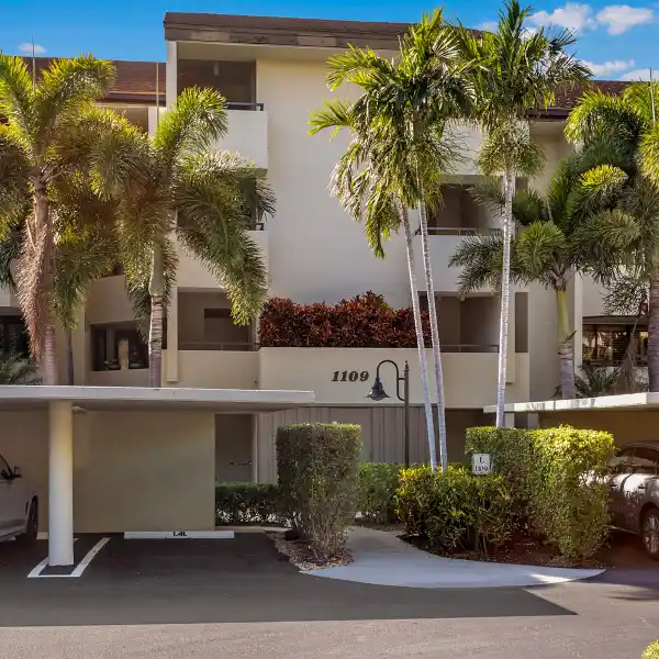STUNNING END UNIT WITH BOAT SLIP IN PRIVATE MARINA