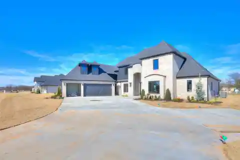 One-of-a-kind New Custom Home on a Large Lot in South Bixby