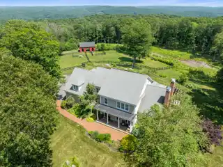 Refined Farmhouse Retreat on 10+ Acres