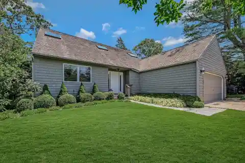 Sunlit Hamptons Escape with Designer Finishes