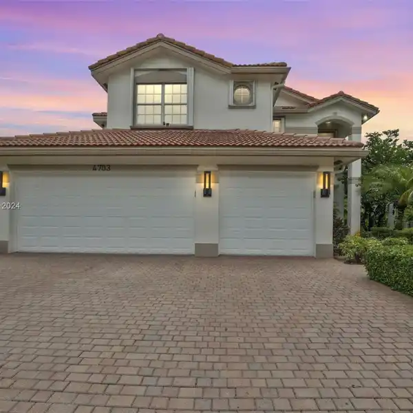 REMODELED EXECUTIVE HOME IN A PREMIER GATED COMMUNITY