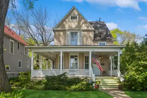 Tree-Lined Street with Wraparound Porch Delight