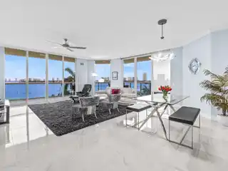 Turnkey Furnished End Unit with Wraparound Balcony