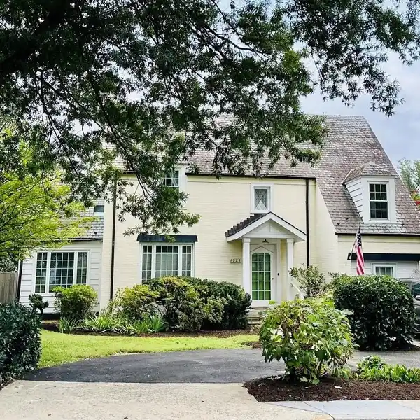 LOVINGLY MAINTAINED AND THOUGHTFULLY EXPANDED BRICK COLONIAL