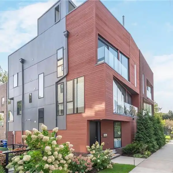 EXQUISITE BRICK AND CEDAR SINGLE-FAMILY RESIDENCE