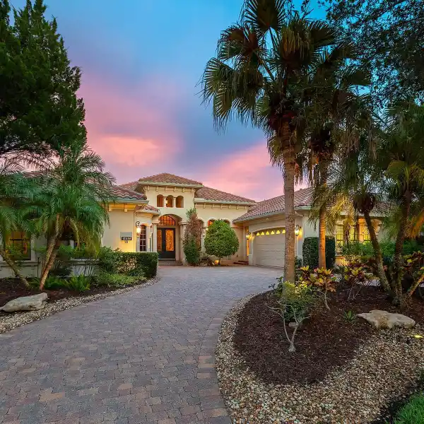 METICULOUSLY CONSTRUCTED FORMER MODEL HOME