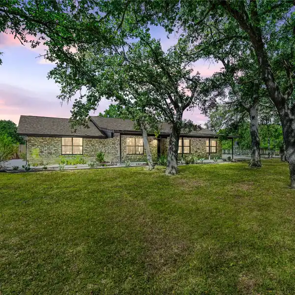 METICULOUSLY RENOVATED HOME ON FIVE SERENE ACRES