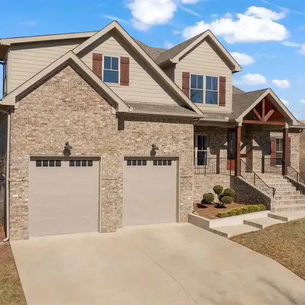 CUSTOM HOME IN THE PRESTIGIOUS OLDE STONE GOLF COURSE COMMUNITY